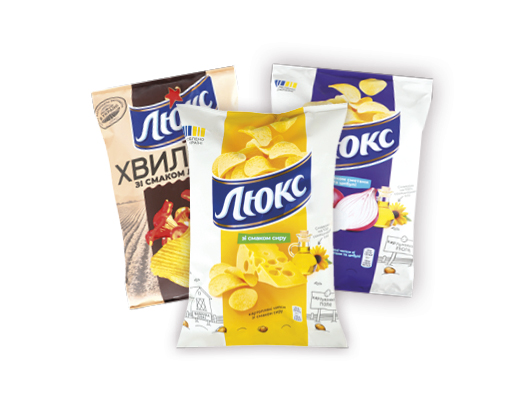 Чипси зі смаком сметани та цибулі, сиру, хвилясті зі смаком лисичок, лосося у вершках, 125 г Люкс™